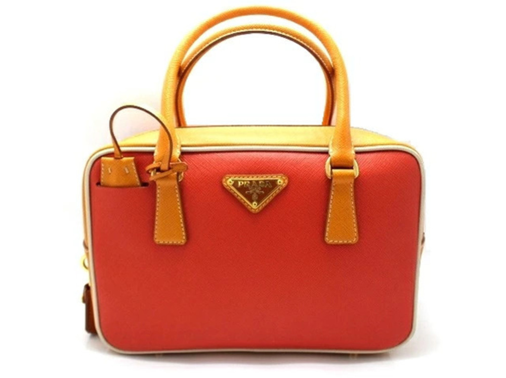 Prada handbag bicolor Saffiano leather orange camel brown padlock